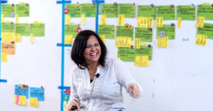 woman engineer presenting from whiteboard