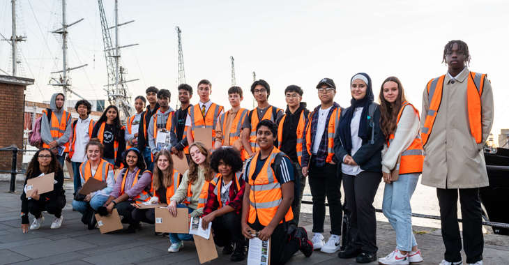 Group of secondary school students at the docks