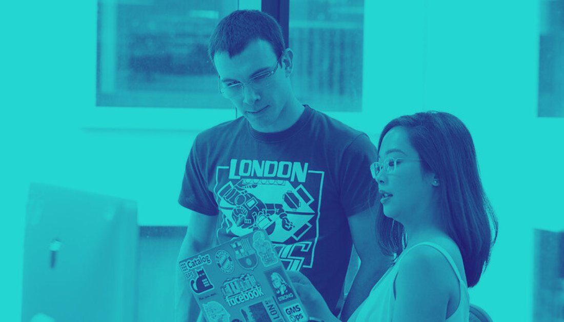 Two people talking in duotone